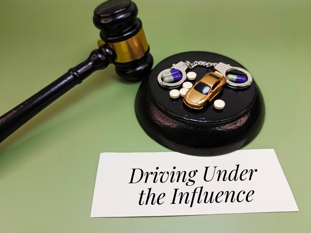 Driving,Under,The,Influence,Written,On,Paper,With,Capsules,,Handcuffs,