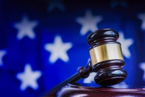 Legal,Law,Concept,Image,,Gavel,With,Us,Flag,Background.