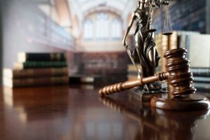 Law,Symbols.,Library,Background.,Gavel,,Wooden,Table,,Books.