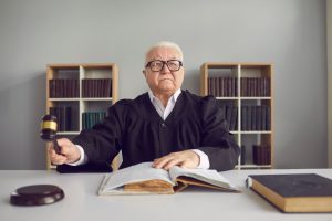 Serious,Mature,Senior,Man,Professional,Judge,In,Black,Mantle,And