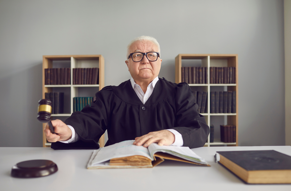 Serious,Mature,Senior,Man,Professional,Judge,In,Black,Mantle,And