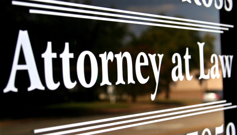 Attorney,At,Law,Sign,On,Window