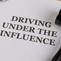 DrivingUnderTheInfluenceTitleOnLegalDocumentsSetOn