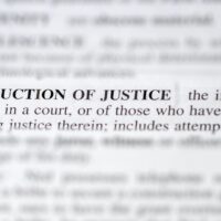CloseUpPhotoOfTheWordsObstructionOfJustice