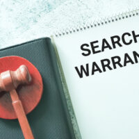 SelectiveFocusPhraseSearchWarrantWrittenOnNoteBookWith